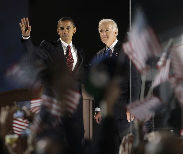 Biden and President-elect Barack Obama wave to the crowd at their election night party at Grant Park in Chicago on November 4, 2008.