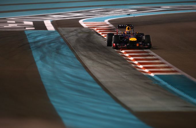The German triumphed by more than 30 seconds at Yas Marina after starting behind Red Bull teammate Mark Webber, who topped Saturday's qualifying. 