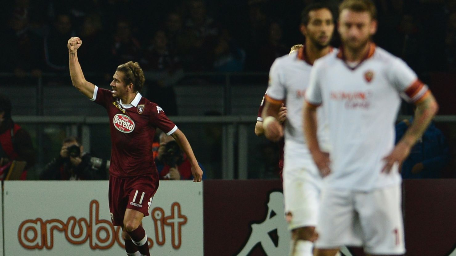 Torino's Alessio Cerci (left) celebrates after equalizing against Roma in Sunday's 1-1 draw in Turin. 