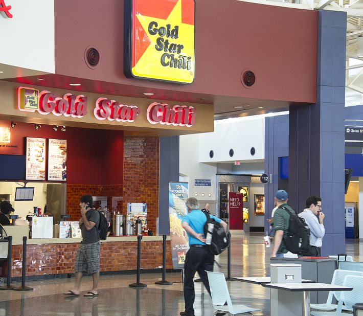 Order the soupy, Greek-style chili, shredded cheddar and onions or beans atop your spaghetti for an authentic local order at the Cincinnati airport. 