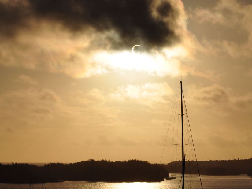 While vacationing in St. Georges, Bermuda, <a href="http://ireport.cnn.com/docs/DOC-1056346">Gareth Seltzer</a> saw the eclipse. "I looked out the window and found the sun so bright I was not able to see it and knew immediately that something remarkable and rare to witness was underway," he said.