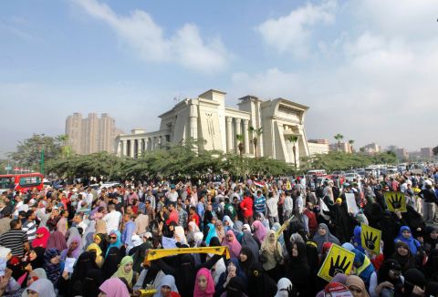 Supporters of deposed Egyptian President Mohamed Morsy protest his trial in front of the Supreme Constitutional Court in Cairo, Egypt, on November 4, 2013. Morsy, who was removed from office in a July 2013 coup, is charged with inciting violence over a constitution he shepherded into effect.