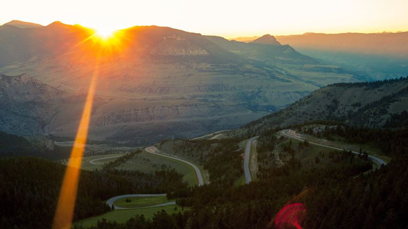 Six months in the planning, the trip seemed like a fun way to spend the summer between college and the rest of their lives. A sunset over Chief Joseph Scenic Byway in northwestern Wyoming is shown here. 