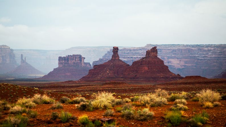 The three riders saved the American Southwest for the last part of their journey, where they were buffeted by storms. Here, in a clear moment, is the Valley of the Gods in southeastern Utah, near Monument Valley.