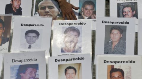 Some of the dozens of portraits of people missing in Mexico's drug war are displayed during a recent protest in Mexico City.
