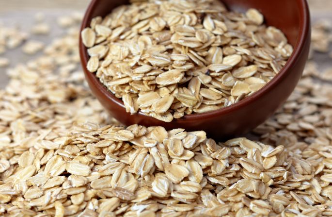 By starting your day off with oatmeal, you get one of your three daily recommended servings of whole grains. Enjoy your oats hot, or try them raw and soaked by following an overnight oats recipe.