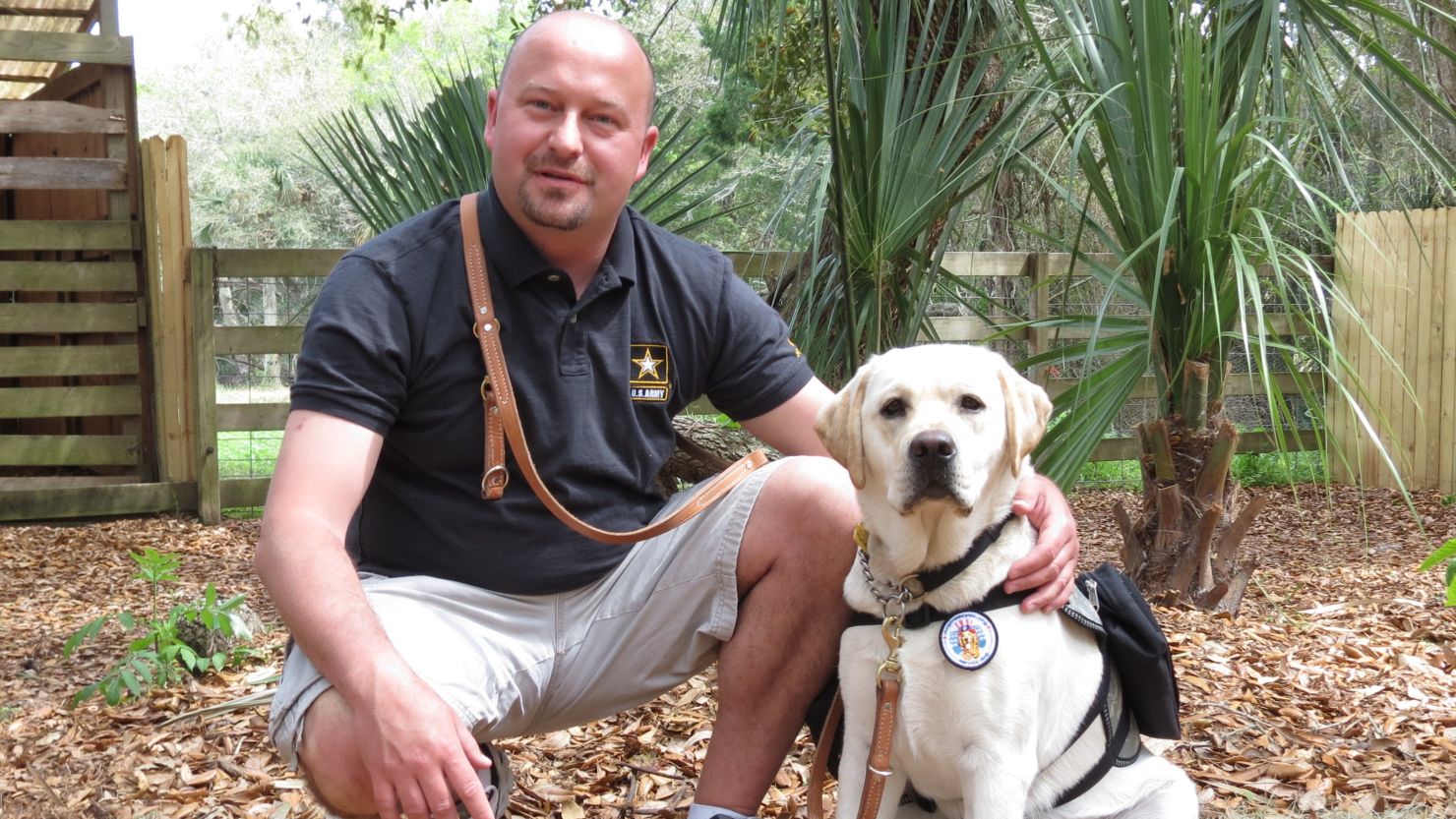 Former Army Spc. Karl Fleming rarely ventured outside before he got Kuchar, a service dog trained to help soldiers.
