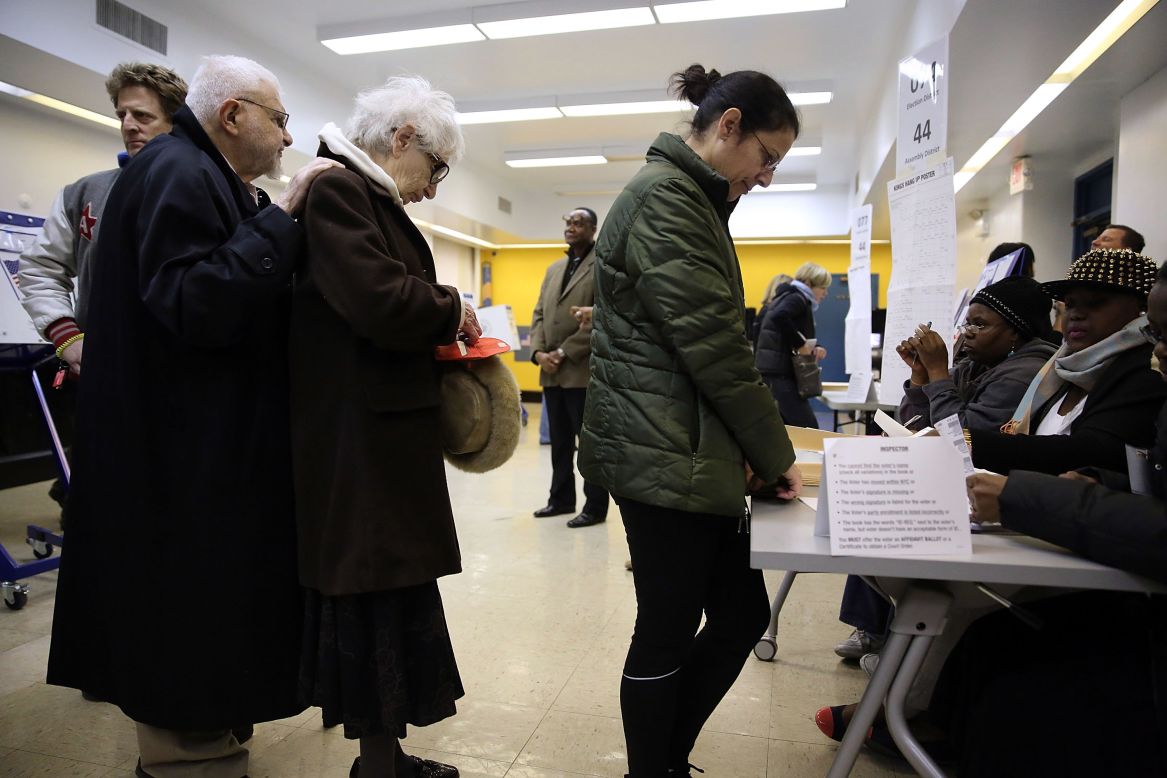 People stand in line to vote in Brooklyn.