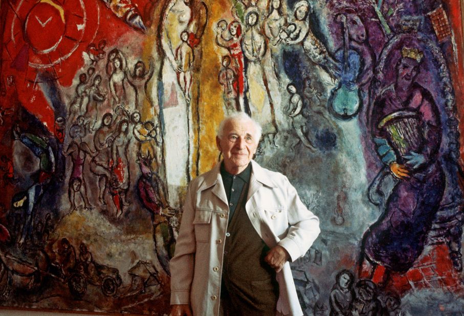 Another "degenerate artist," Marc Chagall, poses in front of one of his works in Nice, France, in 1977. A previously unknown piece by Chagall was among those found in a huge cache of artworks found in Munich in 2012.