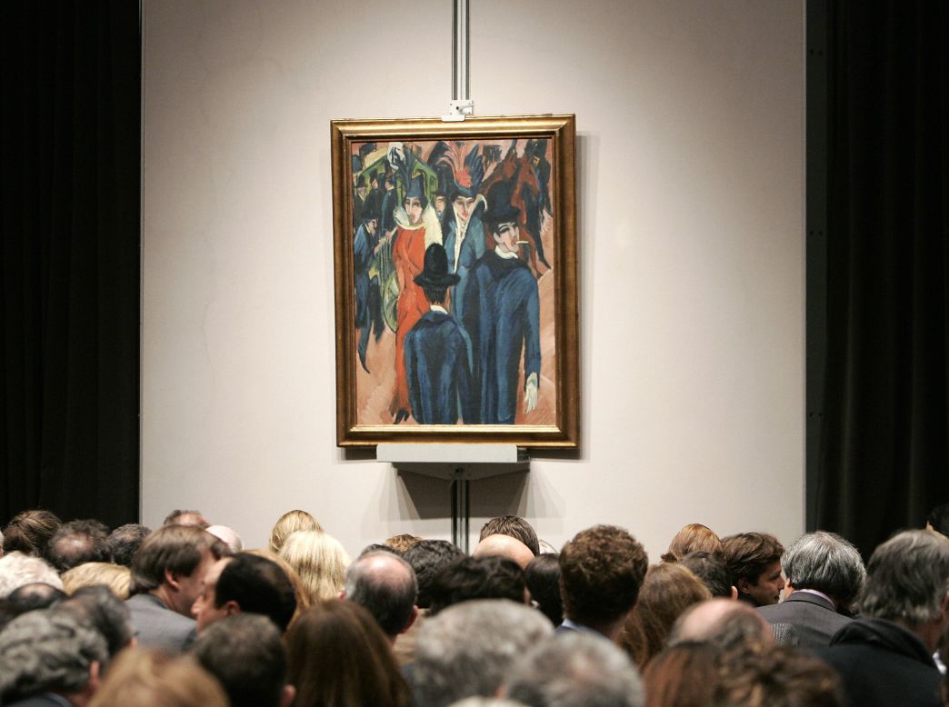 Buyers look at Ernst Ludwig Kirchner's "Berliner Strassenszene" ("Berlin street scene") during a New York sale. Thousands of artworks condemned as "degenerate" by the Nazis were confiscated in the 1930s and 1940s. The restitution of this painting prompted fears that Germany could lose countless pieces found to have been taken from their rightful owners.