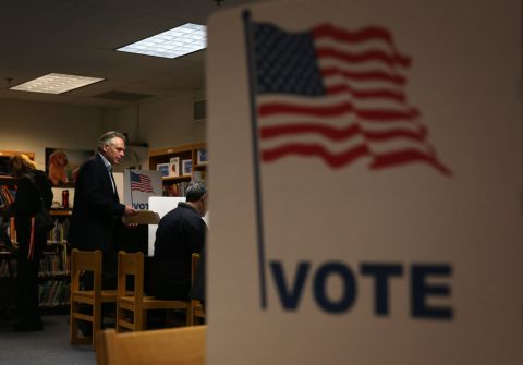 McAuliffe casts his vote. In the last nine elections, the political party controlling the White House lost the governor's race.
