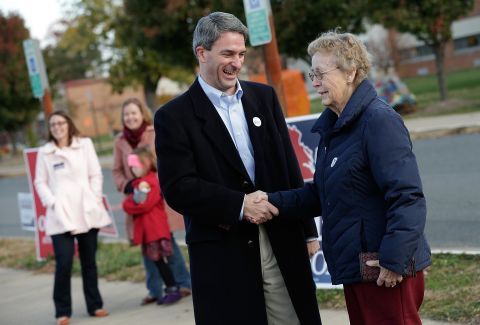 Cuccinelli greets voters after voting.