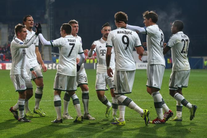 Bayern Munich's players celebrate Mario Mandzukic's goal against Viktoria Plzen to break the deadlock in the Czech Republic.
