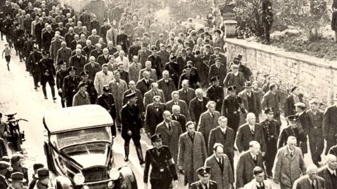 Jewish men are rounded up in Baden-Baden, Germany, for deportation to the Dachau concentration camp.