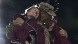 dnt soldier surprises daughters at football game_00010519.jpg