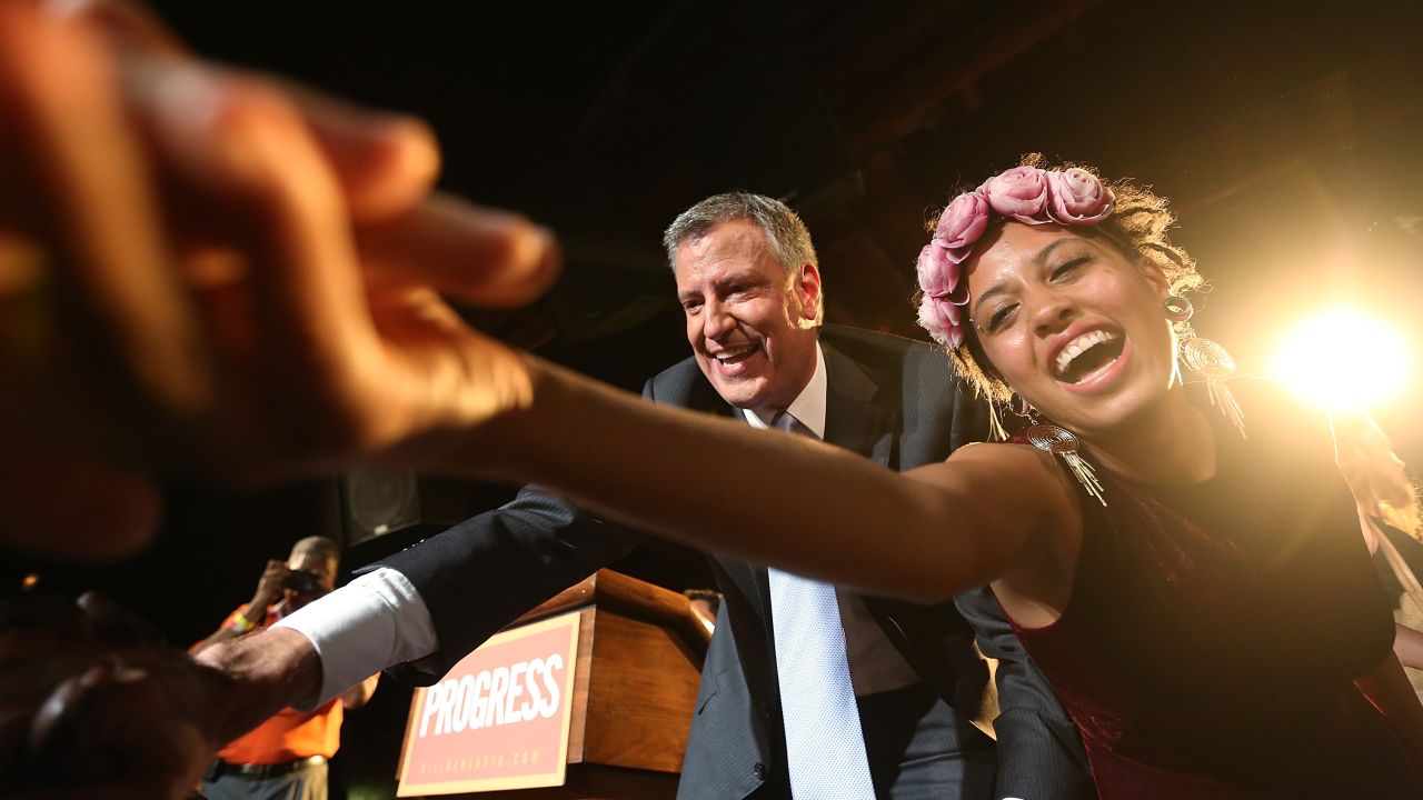 De Blasio and Chiara greet supporters at his primary night party in Brooklyn on September 11. He beat former U.S. House Rep. Anthony Weiner, whose campaign imploded, and also Bloomberg favorite Christine Quinn. De Blasio got more than 40% of the vote, thus avoiding a runoff.