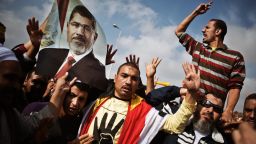 Mohamed Morsy supporters outside the Police Academy where Morsy's trial took place on November 4, 2013 in Cairo.