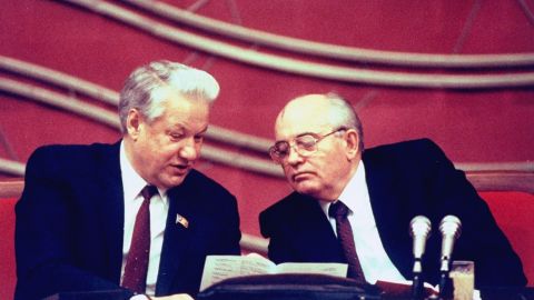 Boris Yeltsin sits with Gorbachev during a session of the Congress of People's Deputies in Moscow in 1990.