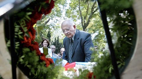 Gorbachev pays his respects to Russian soldiers at a Russian military cemetery in Marl, Germany, in 2003.