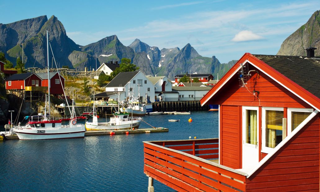Many of Reine's red fishermen's cabins offer direct access to the Norwegian Sea. 