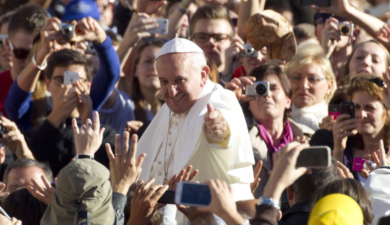 Pope Francis arrives in St. Peter's Square to lead his general audience.