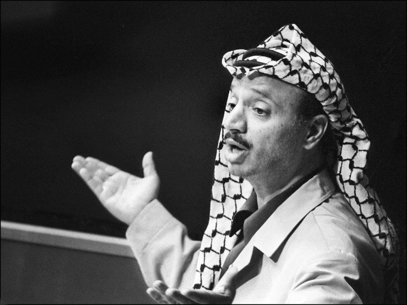 In November 1974, Arafat addresses the General Assembly of the United Nations. "I have come bearing an olive branch and a freedom fighter's gun," he was quoted as saying. "Do not let the olive branch fall from my hand."