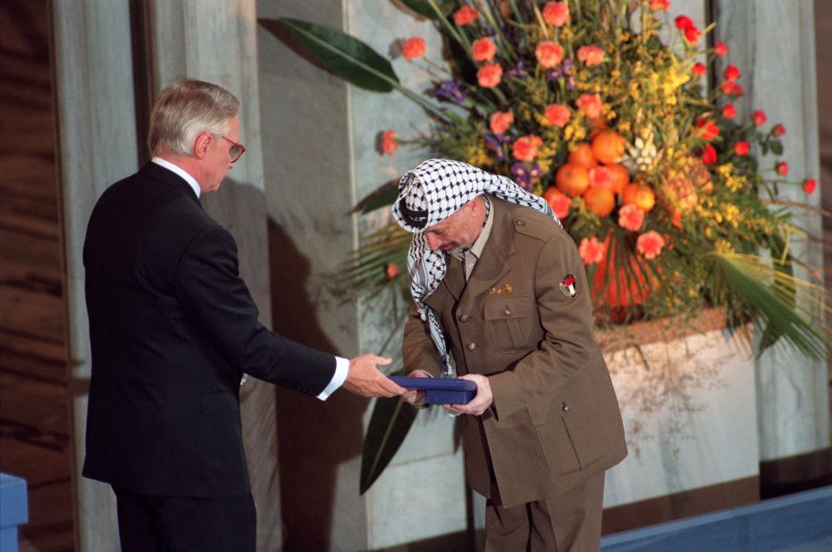 Arafat accepts the Nobel Peace Prize on December 10, 1994. He collected the prize jointly with Rabin and Israeli Foreign Minister Shimon Peres, in recognition of their historic peace accord. 