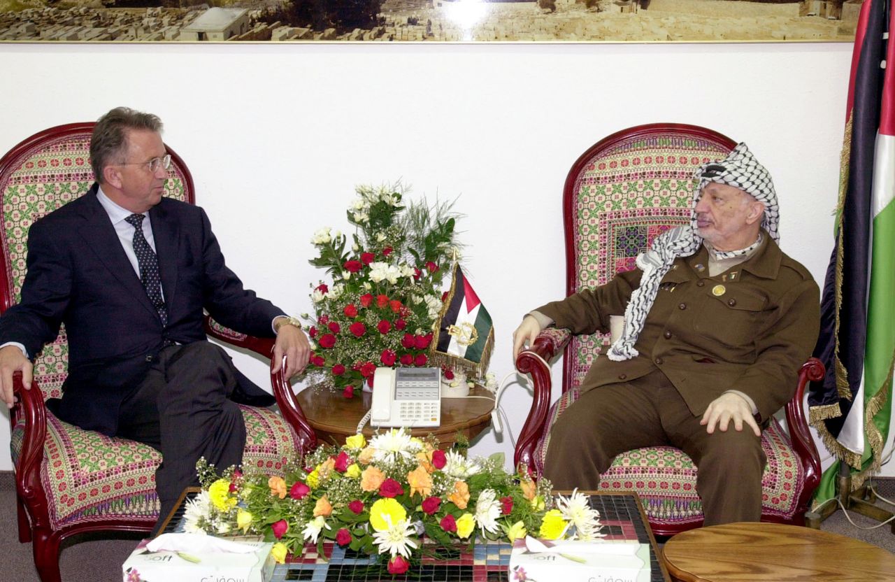 Arafat meets with United Nations Mideast envoy Terje Roed-Larsen in Gaza City on October 17, 2001. Arafat agreed to a cease-fire that would end several weeks of fighting between the Palestinian and Israeli armies.