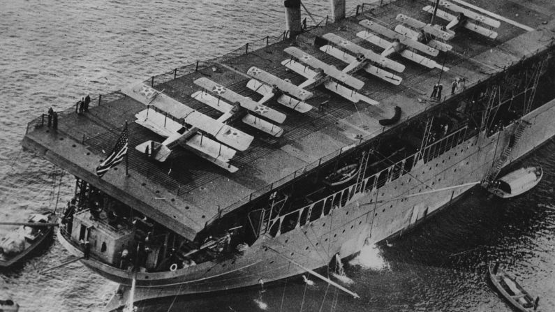 The USS Langley, the Navy's first aircraft carrier and sole member of its class, steams off the coast of Baltimore in 1924.