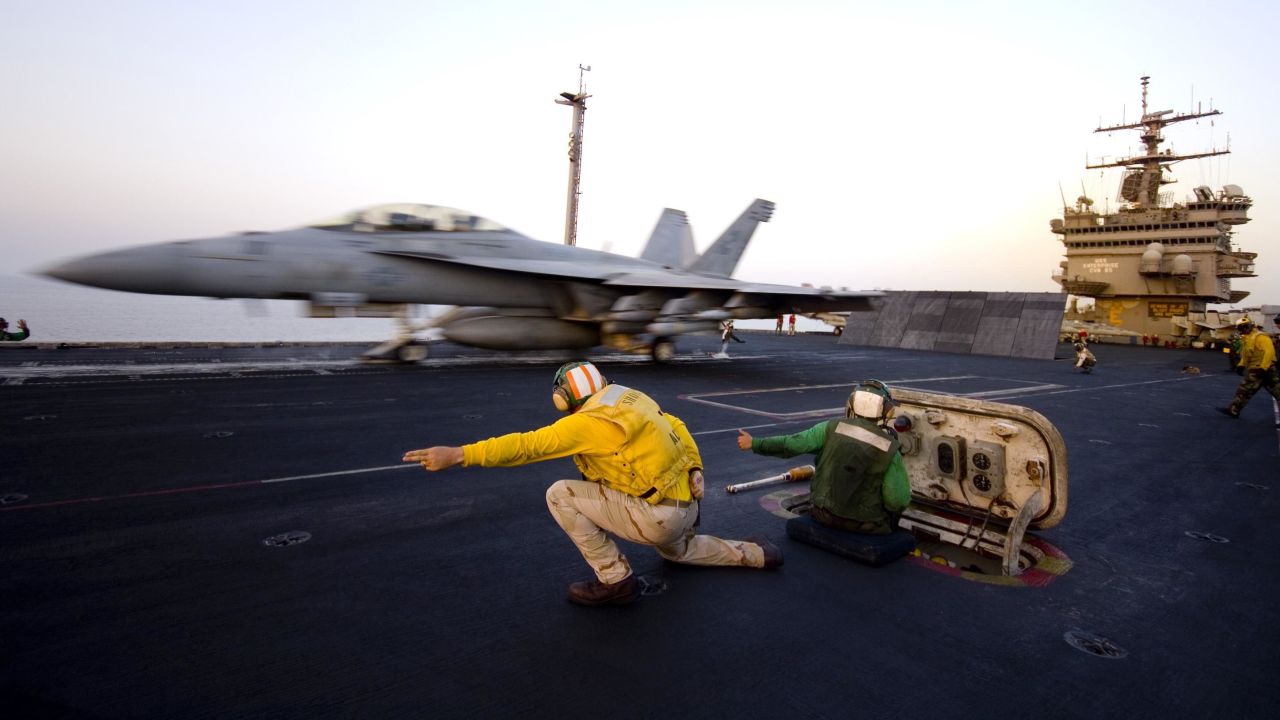 An F/A-18 Hornet launches from the USS Enterprise in 2007. The Enterprise, the world's first nuclear-powered aircraft carrier, was decommissioned in 2012. Like the John F. Kennedy, it was the only ship built in its class.