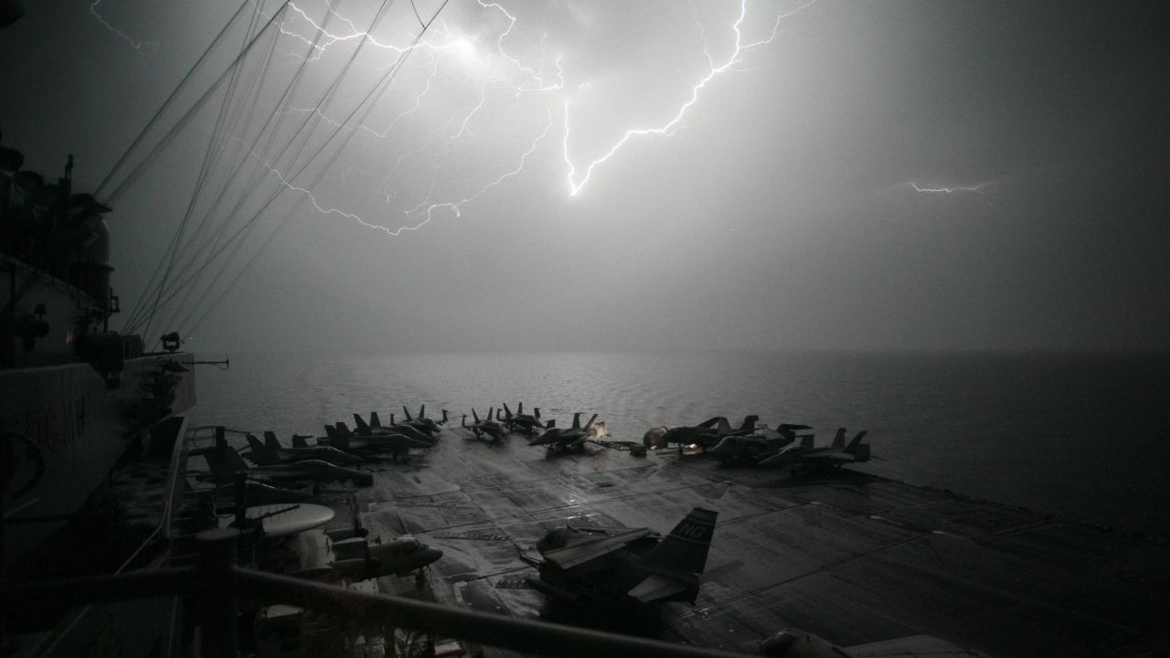 Lightning strikes over the flight deck of the USS John C. Stennis, another Nimitz-class aircraft carrier, as the ship moves through the Persian Gulf in 2007. All of the Navy's 10 active aircraft carriers are from the Nimitz class, which started in 1975 with the commission of the USS Nimitz.