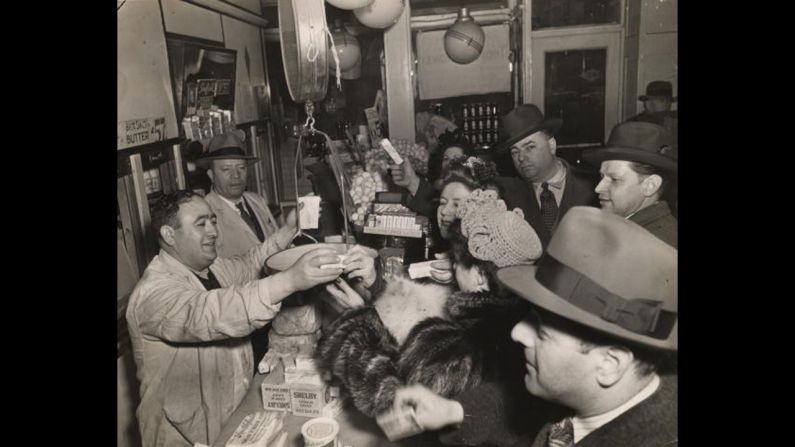 The Kaltman family tries to sell as much butter as possible at their New York dairy store in 1943 before a government deadline to freeze sales. During World War II, the federal government rationed butter in an attempt to control supply and demand while manufacturing plants were being used to support the war effort. As a result, margarine, which contains trans fat, grew in popularity. 