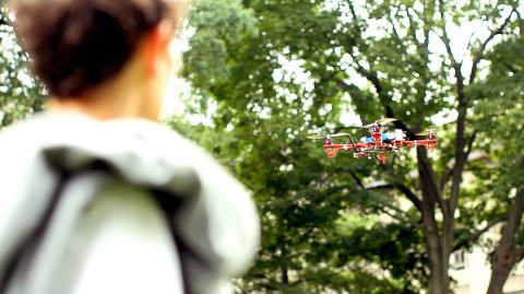 The flying robot uses your phone's GPS location to find you. It also features it's own in-built GPS to find destinations. 