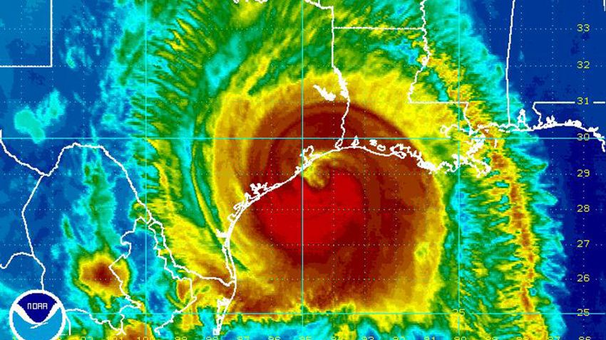 This image provided by NOAA taken at 11:45 p.m. EDT Friday Sept. 12, 2008 shows Hurricane Ike approaching the coast of Texas. At 11 p.m. EDT, Ike was centered about 55 miles southeast of Galveston, moving at 12 mph. It was close to a Category 3 storm with winds of 110 mph, and was expected to strengthen by the time the eye hit land. Because of the hurricane's size, the state's shallow coastal waters and its largely unprotected coastline, forecasters said the biggest threat would be flooding and storm surge, with Ike expected to hurl a wall of water two stories high _ 20 to 25 feet _ at the coast. (AP Photo/NOAA)