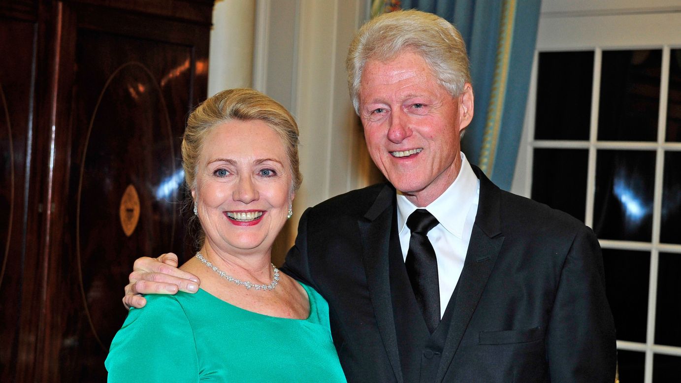 Former Secretary of State Hillary Clinton and former President Bill Clinton attend a State Department dinner in 2012. Hillary Clinton is the presumptive Democratic nominee for president. 
