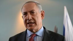 Israeli Prime Minister Benjamin Netanyahu speaks to the press following his meeting with US Secretary of State (unseen) at Ben Gurion airport near Tel Aviv on November 8, 2013. Netanyahu warned John Kerry he was offering Iran the "deal of the century" as the US top diplomat headed to landmark talks in Geneva seeking a nuclear agreement. AFP PHOTO/POOL/Debbie HillDEBBIE HILL/AFP/Getty Images