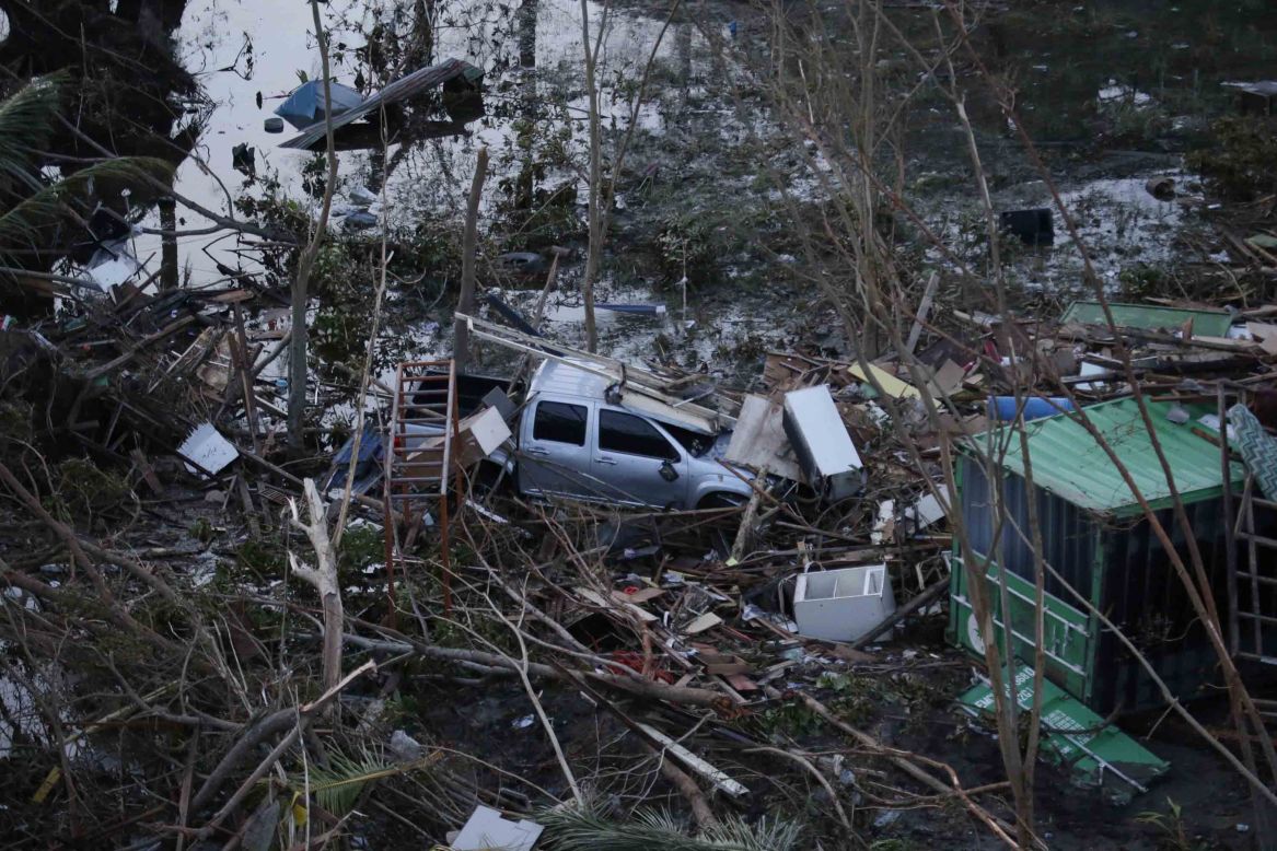 A vehicle lies amid Tacloban debris on November 9.
