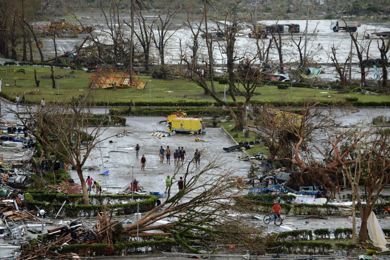 Fallen trees litter the ground at the Tacloban airport on Saturday, November 9.