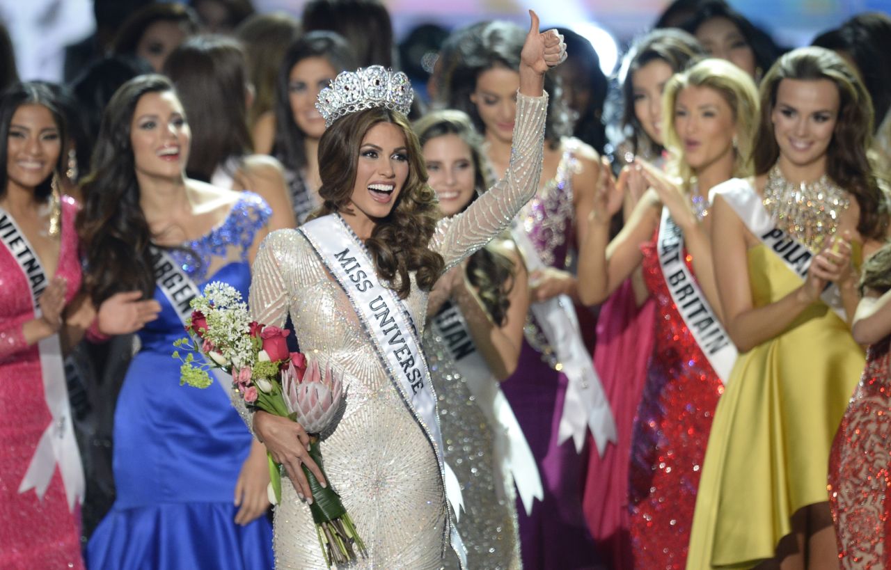 Other contestants applaud the new Miss Universe.