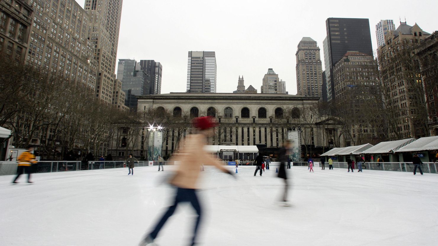 In this file image, a skater takes to the ice on the rink at Bryant Park. A shooting at the rink on Saturday left two people injured.