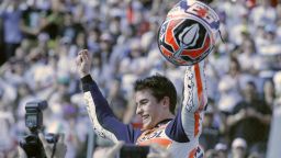 Marc Marquez is hoisted aloft after claiming the MotoGP title. The 20-year-old Spaniard is the youngest rider ever to win the world championship and the first rookie since American Kenny Roberts did it in 1978.