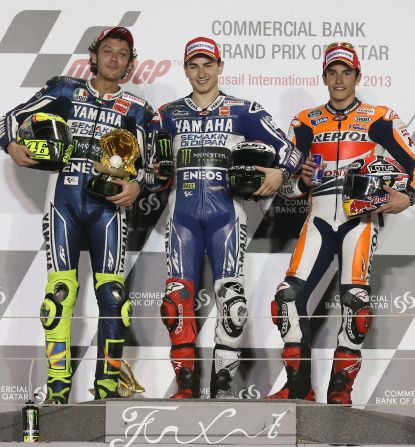 Marquez (right) made an immediate impression in MotoGP, finishing third in the opening race of the season. Jorge Lorenzo (center) won the race with Valentino Rossi finishing second. 