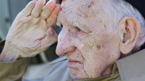 Jesse Beazley, a World War II veteran and D-Day survivor, salutes during the national anthem before a college football game between Kentucky and Missouri in Lexington, Kentucky, on Saturday, November 9. <br /><a href="http://www.cnn.com/2013/11/08/showbiz/gallery/celebrity-vets/index.html">Photos: Celebrities who served</a><br /><a href="http://cnnphotos.blogs.cnn.com/2013/11/08/every-bit-a-woman-every-bit-a-veteran/">Photos: Female veterans</a>