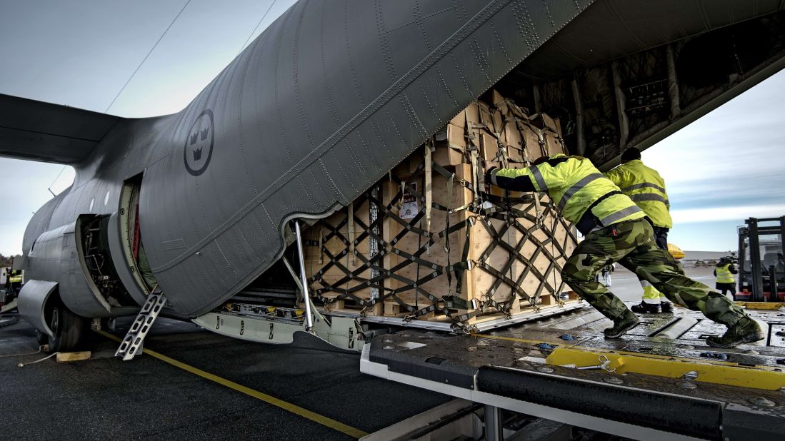 Staff load a Hercules airplane with equipment November 11 at the Orebro airport in central Sweden. The Swedish Civil Contingencies Agency, together with its humanitarian partners, sent equipment to support the United Nations' relief work in the Philippines.