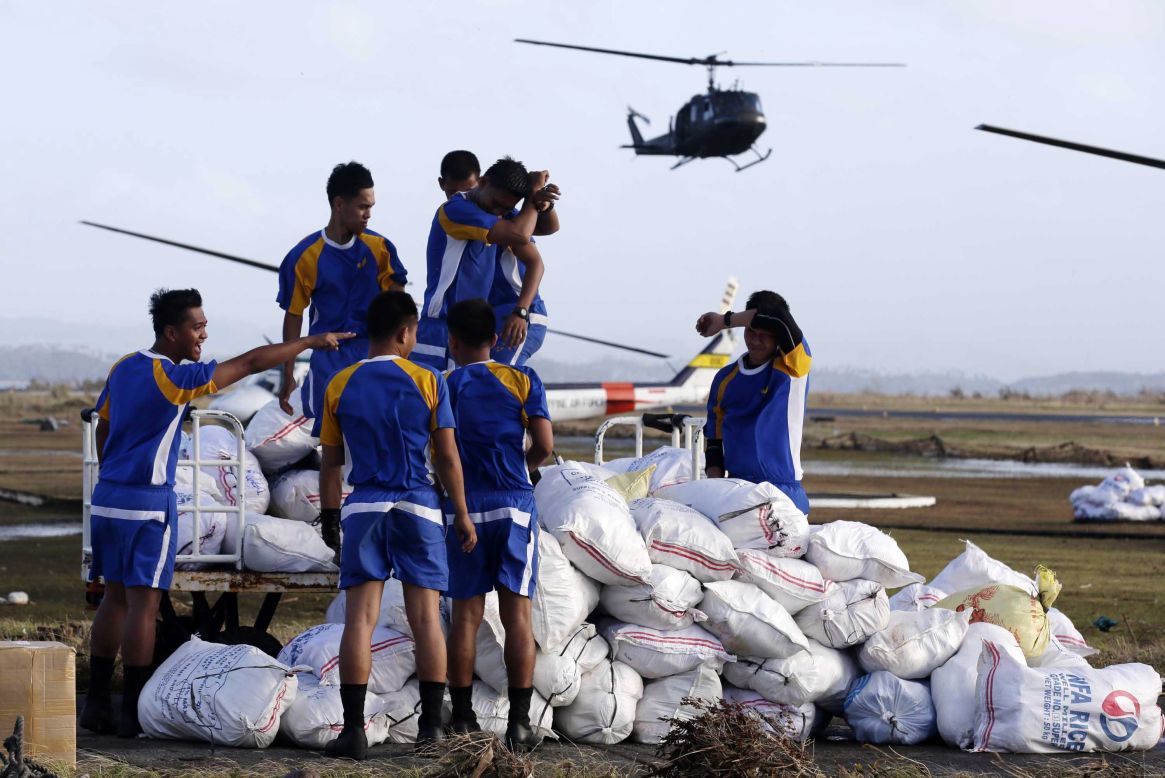 Philippine Air Force personnel prepare to load relief supplies at the Tacloban airport on November 11.