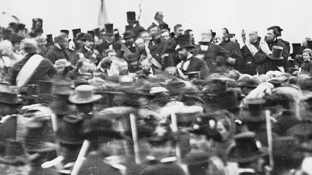 Abraham Lincoln arrives to deliver the Gettysburg Address, center right, November 19, 1863.