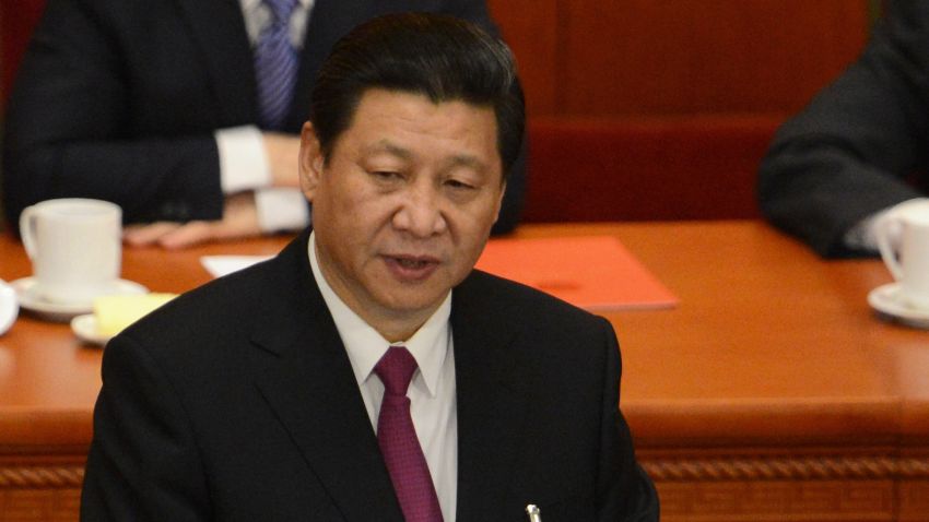 Newly-elected Chinese President Xi Jinping delivers his maiden speech at the closing session of the National People's Congress (NPC) at the Great Hall of the People in Beijing on March 17, 2013. Xi Jinping told the country's military to improve its ability to "win battles" in his first speech as head of state, as Beijing is embroiled in a bitter territorial row with Japan. AFP PHOTO / GOH CHAI HINGOH CHAI HIN/AFP/Getty Images