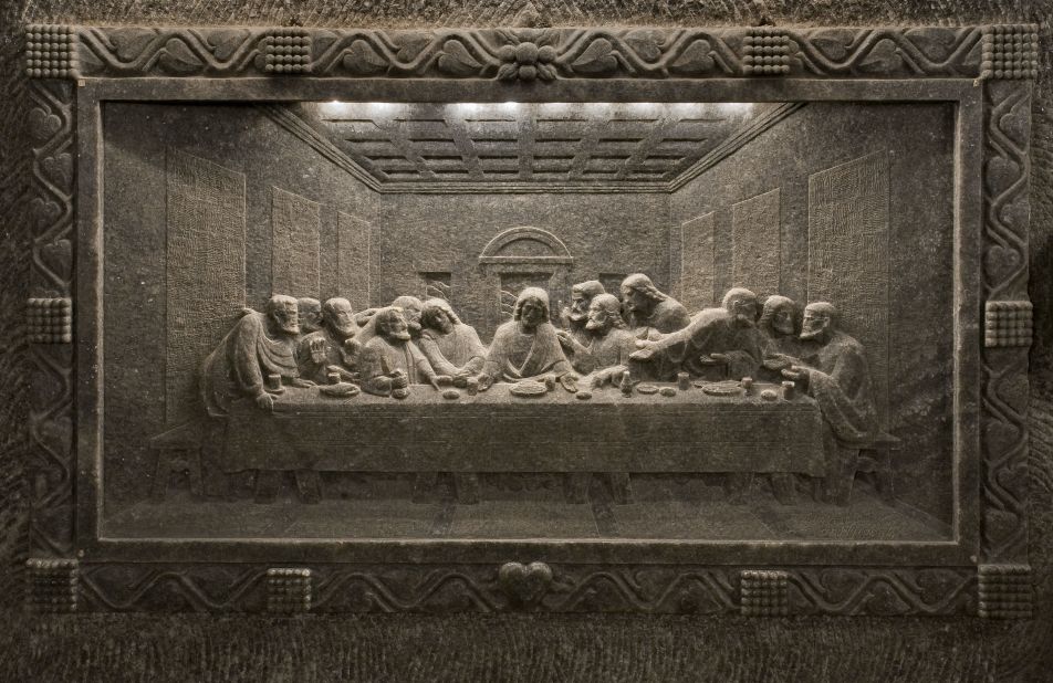 A frieze of 'The Last Supper' carved into the side of a subterranean cave at the Wieliczka salt mine.