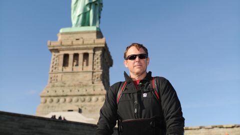 Paralyzed since 2008, veteran Gary Linfoot took a walk around the Statue of Liberty with the help of a bionic device.