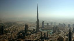 An aerial view shows Burj Dubai (C), the world's tallest tower built by Emaar property developer, in the Gulf emirate of Dubai on December 17, 2009. Dubai faces financial difficulties due to debts estimated at between 80 and 100 billion dollars. The emirate announced on November 25 that it sought a six-month debt moratorium for state-owned conglomerate Dubai World, sparking global fears of a Dubai debt default. AFP PHOTO/MARWAN NAAMANI (Photo credit should read MARWAN NAAMANI/AFP/Getty Images)